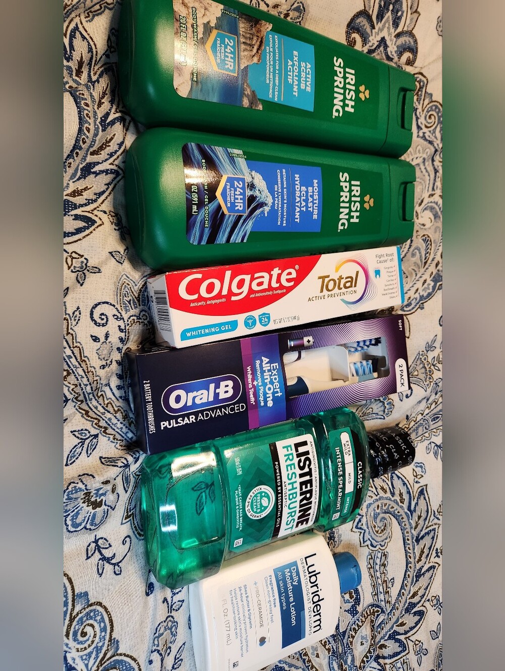 Selfcare Bundle. Listerine, Lubriderm, OralB Electric Toothbrush, Irish Spring.